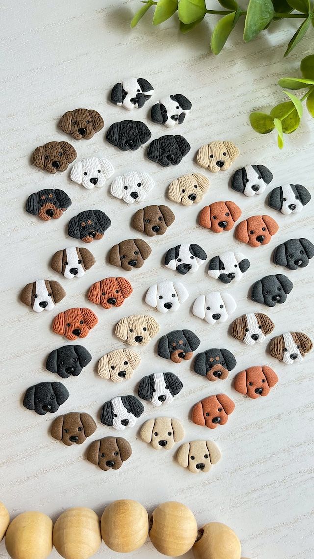 the dog magnets are made out of wood and have different colored dogs on them