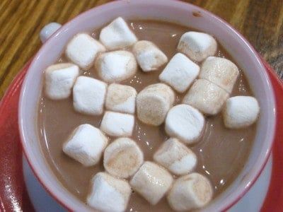 hot chocolate with marshmallows in a red bowl