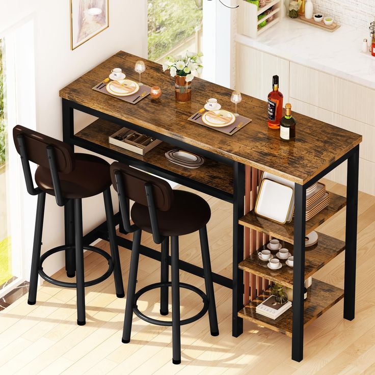 a kitchen table with three stools next to it