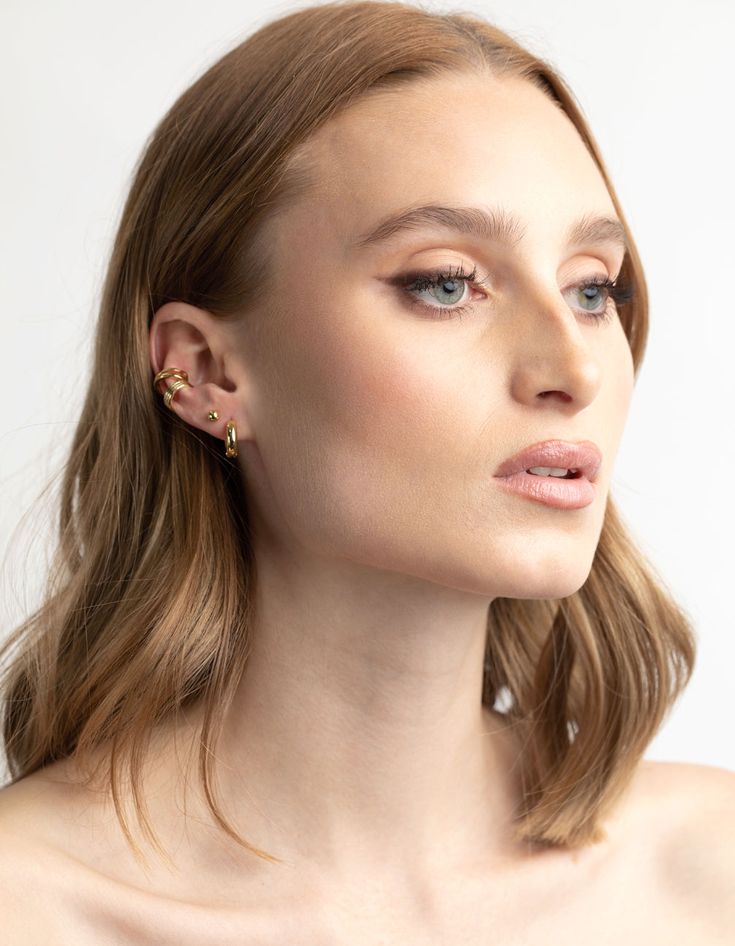 Upgrade with this 8-pack of gleaming gold plated huggie and cuff earrings. This set of stackable stunners lets you mix, match and make a statement with effortless style. Pair them with everything from workday basics to weekend fits for a dose of glam. Material: Gold Plated Dimensions: Length 13 mm x Width 3 mm Smallest Earring Length 3 mm x Smallest Earring Width 3 mm | Lovisa Gold Plated Basic Huggie & Cuff Earrings 8-Pack Earring Stack, Leaf Earring, Cuff Earring, Rose Gold And Silver, Crystal Design, Effortless Elegance, Moon Earrings, Small Earrings, Cuff Earrings