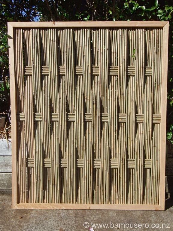 a wooden frame made out of bamboo sticks