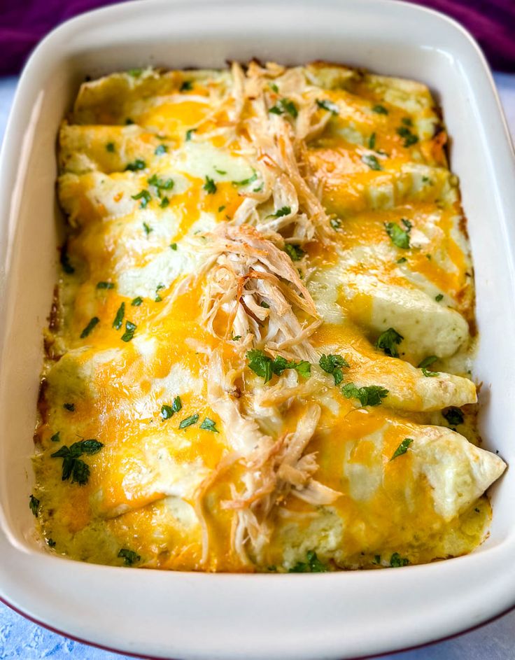 a casserole dish with chicken and cheese