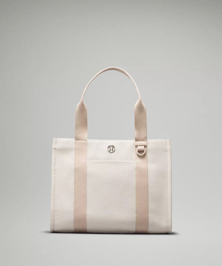 Two-Tone Canvas Tote Bag 10L | Women's Bags,Purses,Wallets | lululemon Lululemon Bags, Reversible Tote Bag, Free Tote, Michelle Yeoh, White Tote Bag, Nylon Tote Bags, Light Ivory, White Tote, Nylon Tote