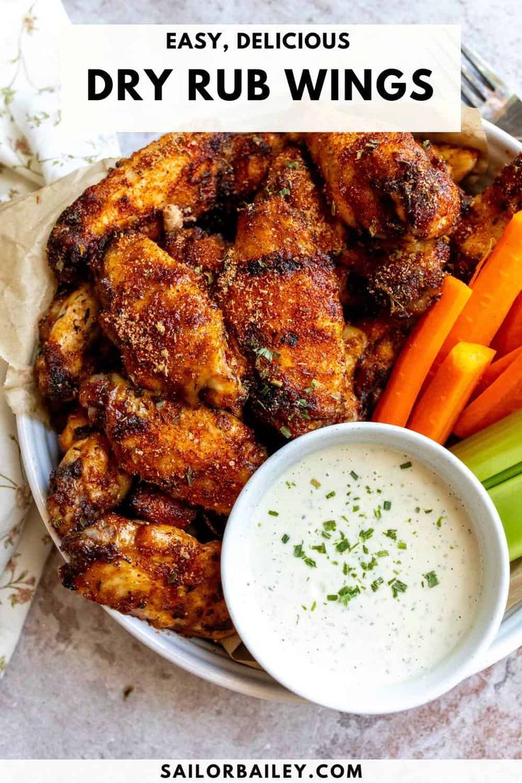 chicken wings and carrots with ranch dressing in a bowl on the side text overlay says easy, delicious dry rub wings