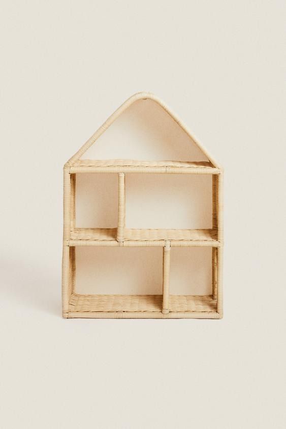 a doll house made out of wood with shelves in the shape of a small house