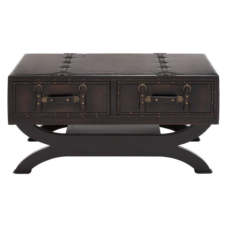 an antique trunk coffee table with two drawers on one side and three open compartments on the other