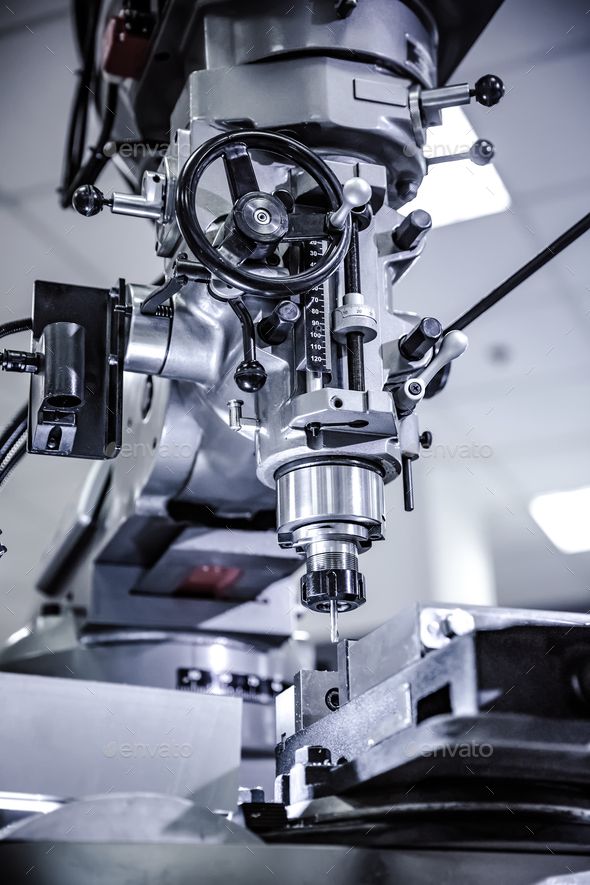 a machine that is working on something in the process of being made - stock photo - images