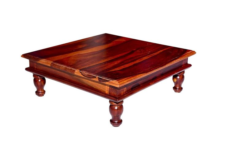 a square wooden table with two legs