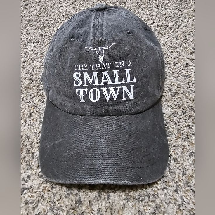 This Listing Is For A Jason Aldean- " Try That In A Small Town" Dark Gray Ball Cap. ** Not An Official Product ** 100% Cotton White Printed Design Adjustable Metal Backing New In Package Smoke-Free And Pet-Free Home Keywords: Small Town, Unisex Ballcap, Ball Cap, Try That In A Small Town, Jason Aldean, Mother's Day, Spring, Summer, Music, Country Music, Casual, Minimalist-Style, Farm, Farmhouse, Girlfriend, Wife, Husband, Unisex, Women's Cap, Men's Cap Detroit Tigers Hat, New York Yankee Hat, Kids Baseball Caps, Music Country, Flex Fit Hats, Large Hats, Jason Aldean, Summer Music, Cap Mens