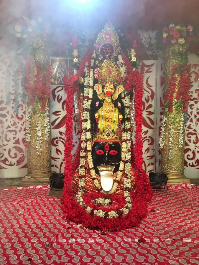 a decorated shrine with flowers and candles