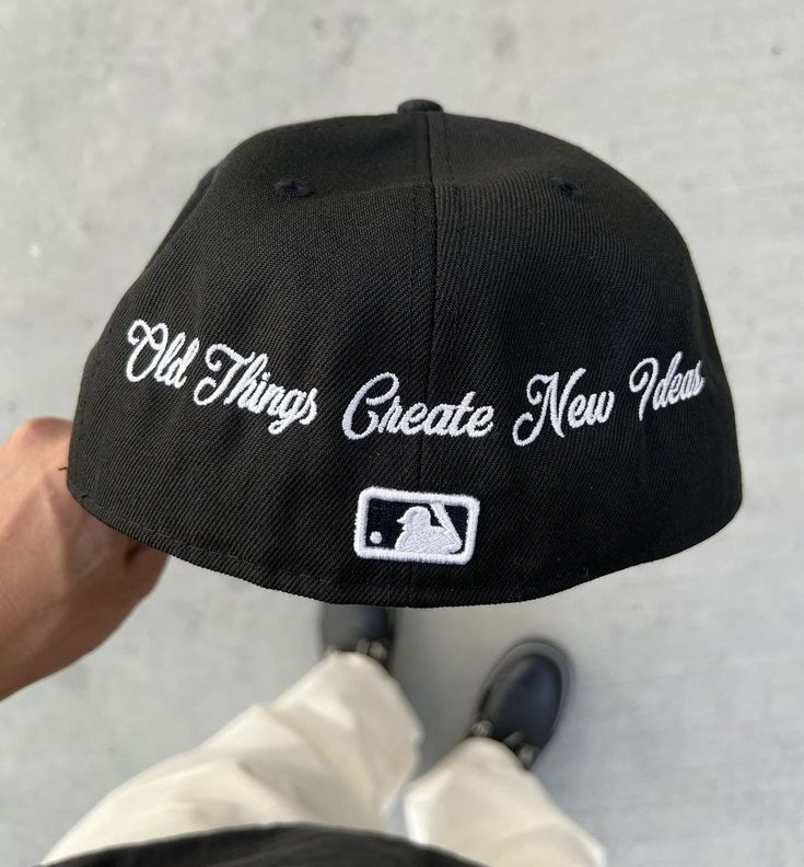 a baseball cap that says all things create new heights