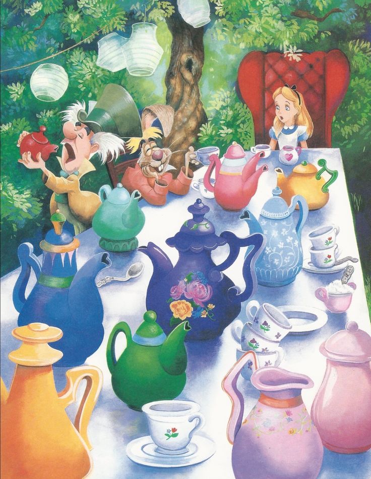 there are many teapots and cups on the table