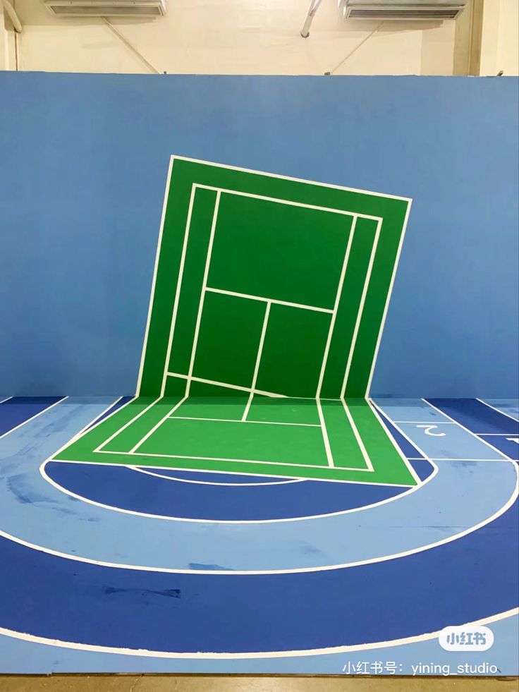 a tennis court cut out into the shape of a ball