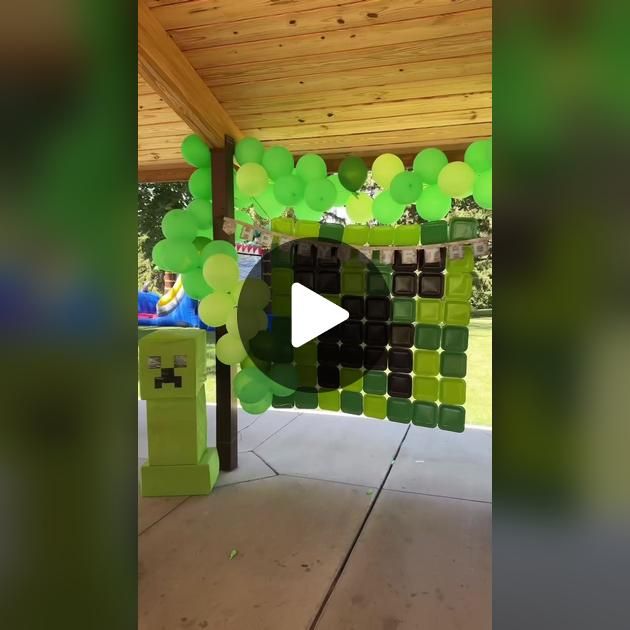 an image of a video screen shot of a birthday party with balloons and streamers