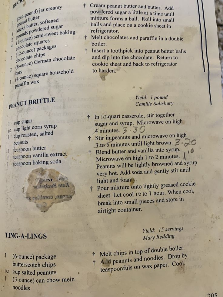 an old recipe book with some writing on it's pages and the contents inside