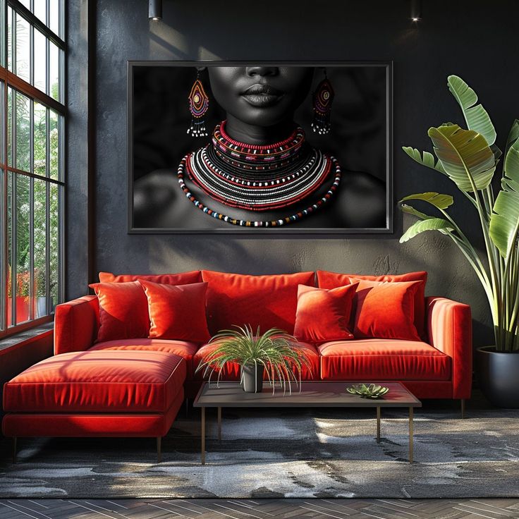 a living room with a red couch and large painting hanging on the wall above it