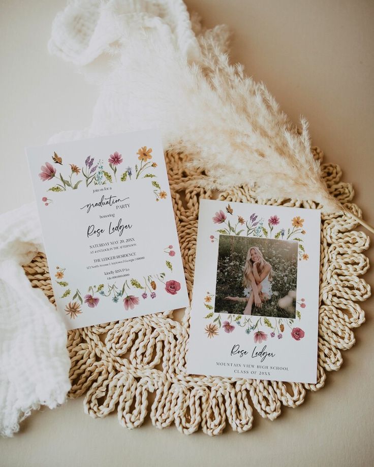 the wedding stationery is laid out on a doily