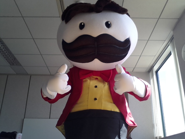 an inflatable character dressed as a man with a mustache and moustache