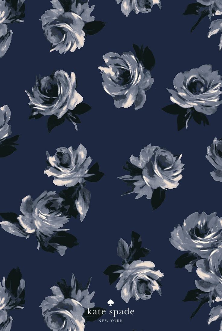 a black and white rose pattern on a dark blue background with the words kate spade