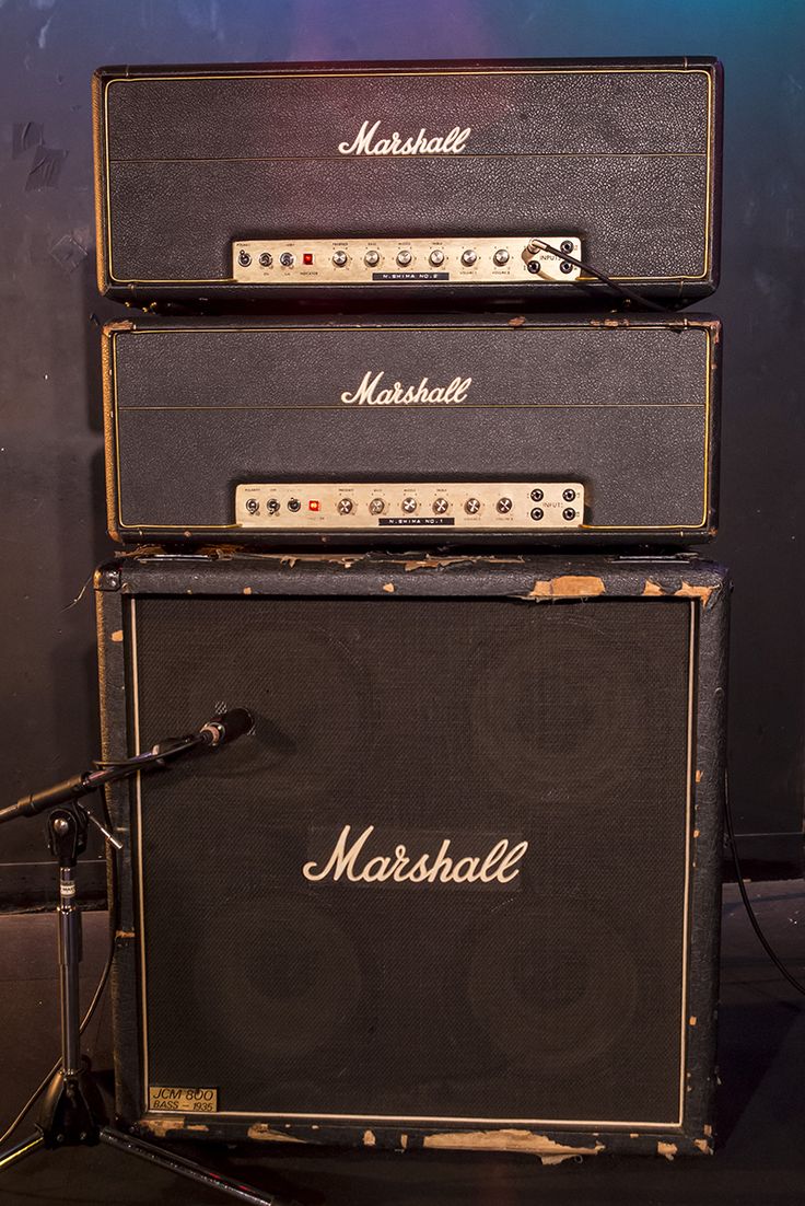 three marshall amps stacked on top of each other