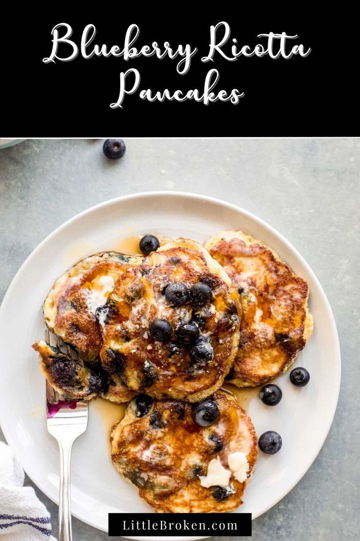 blueberry ricotta pancakes on a white plate