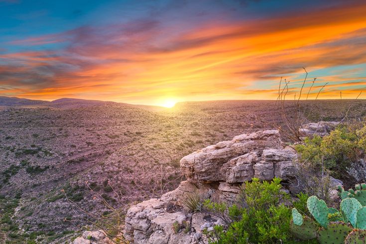 the sun is setting over some rocks and cactus plants in the desert with an inspirational quote on it