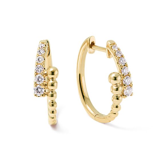 Introducing hoop earrings that know how to make a statement. Crafted in warm 14-karat yellow gold  these natural diamond hoops feature a modern design and will add sparkle to any outfit. Modern Brilliant Cut Yellow Gold Huggie Earrings, Modern Hoop Earrings With Single Cut Diamonds, Unique Diamond Earrings, Modern Gold Jewelry, Diamond Collection, Jewelry Post, Hoops Earrings, Rings Engagement, Diamond Hoop Earrings