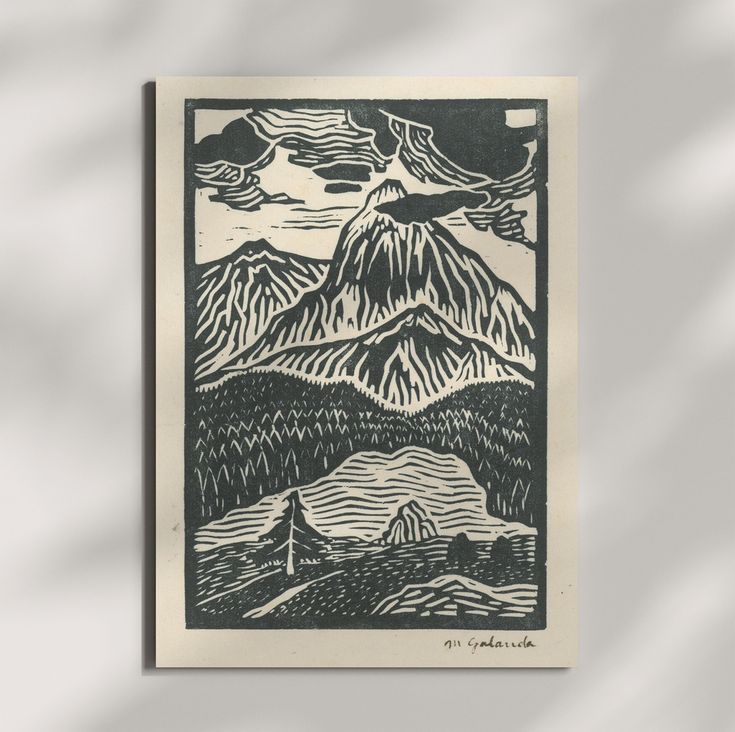 a black and white print with mountains in the background