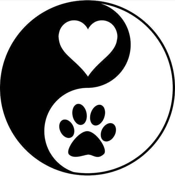 the yin symbol with a dog's paw and heart