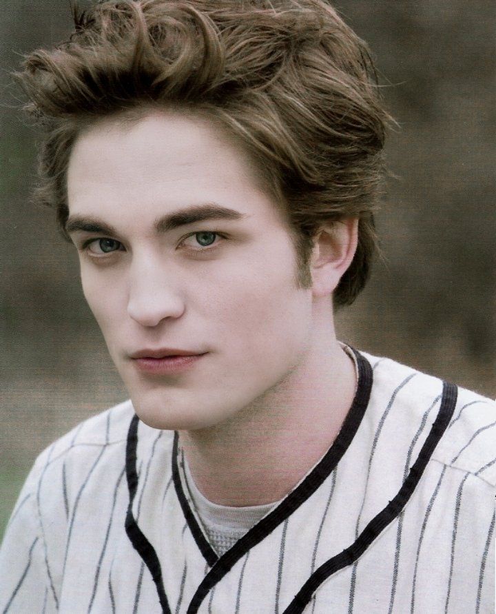 a close up of a person wearing a baseball uniform and looking at the camera with a serious look on his face