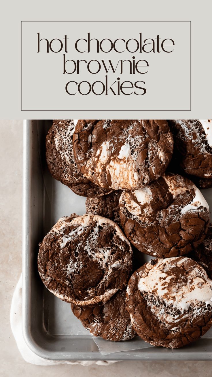 chocolate brownie cookies in a baking pan with the words, hot chocolate brownie cookies