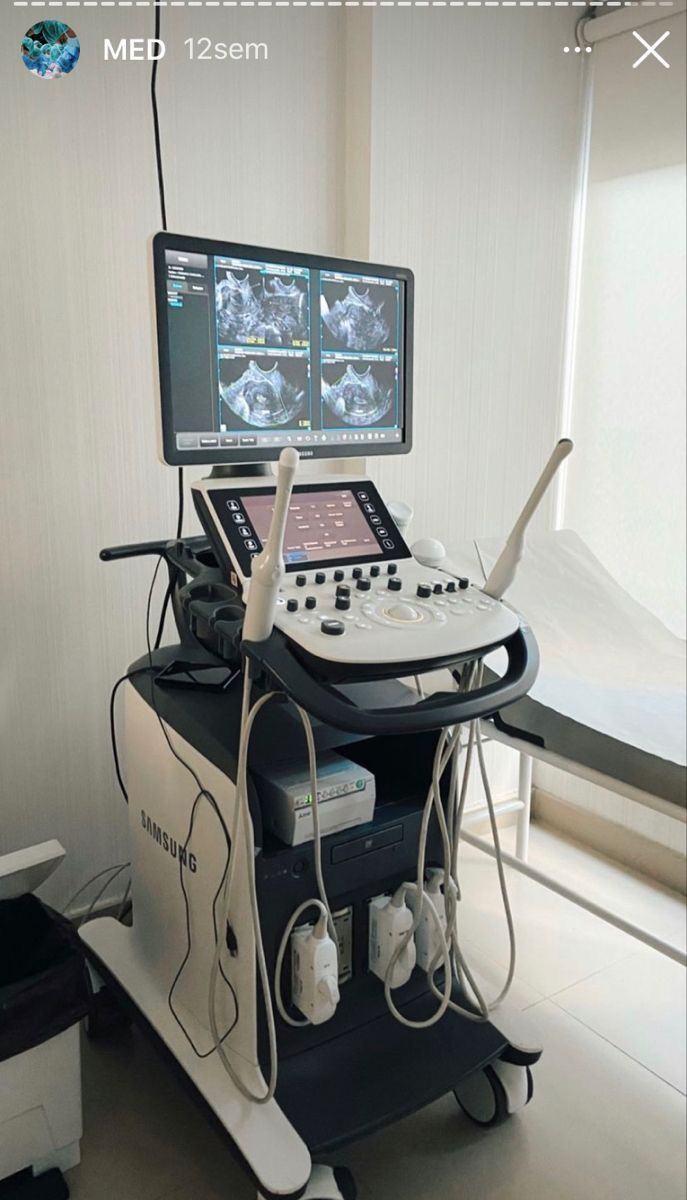 a medical machine with two monitors on it