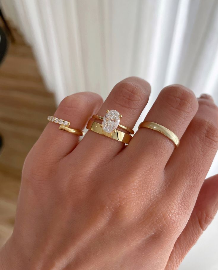 A stunning Oval Solitaire paired with: ⁠ ⁠ 🤍 4mm Classic Flat Band  ⁠ Ring Details:⁠ Emily Oval Solitaire with Tapered Band  1.50ct | E | VVS2 Timeless Engagement Rings Thick Band, Flat Gold Wedding Band With Oval Engagement Ring, Engagement Ring With Flat Band, Gold Wedding Bands Women Oval Ring, Tapered Oval Engagement Ring, 1.25 Carat Oval Engagement Ring, Oval Ring With Thick Band, Oval Engagement Ring With Thick Gold Band, Wedding Ring With Thick Band