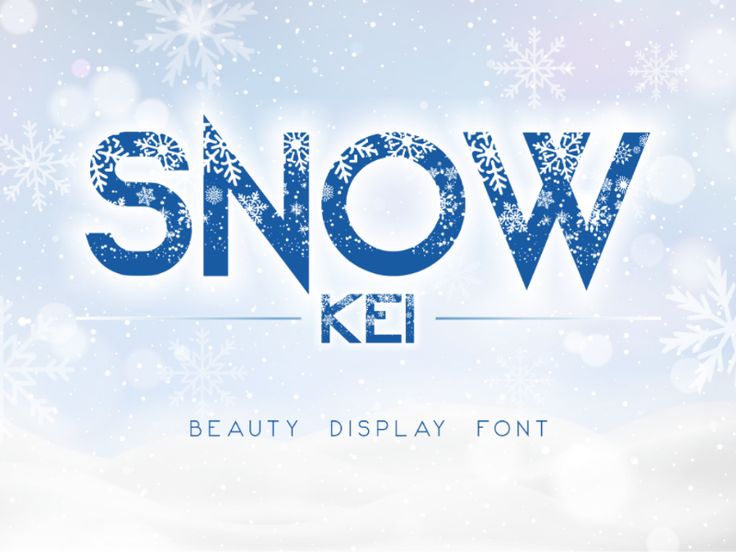 snow kel display font on a blurred background with snowflakes in the background