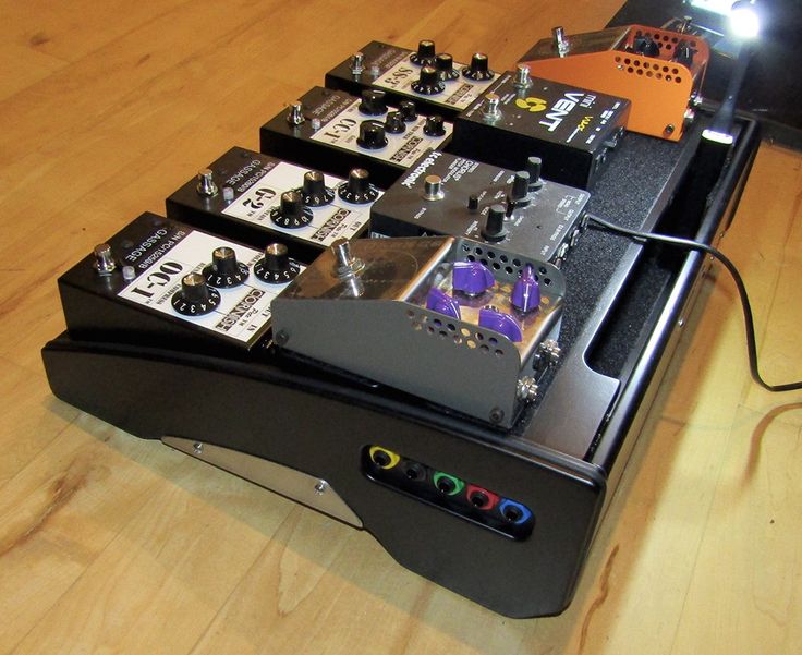 an array of electronic equipment sitting on top of a table