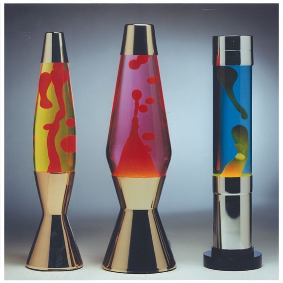 three different colored vases sitting next to each other