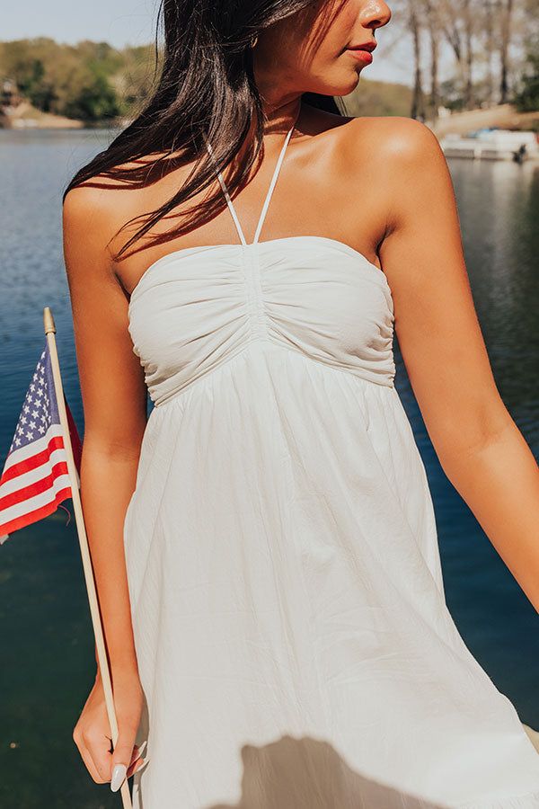 - Whether you are headed to a beachside brunch, a rooftop party, or a leisurely stroll through the park, this fabulous dress is your go-to choice for casual elegance! - Lightweight material - A built-in lining - A halter tied sweetheart neckline that goes down into a drawstring ruched detail - An interior non-slip strip - A smocked back - Functional side pockets - A flowy and flattering silhouette that ends in a ruffled high-low hemline Measurements S : Bust 26-28", Hip 42", Length 39", Slip Len Beachy Mini Dress For Brunch During Beach Season, Beachy Midi Dress For Brunch During Beach Season, Breezy Sundress For Beach Season Brunch, Chic Sundress For Beach Party In Summer, Breezy Maxi Dress For Beach Party In Spring, Breezy Beach Dress For Day Out, Breezy Maxi Dress For Summer Beach Parties, Chic Sundress For Summer Beach Party, Breezy Maxi Dress For Spring Beach Party