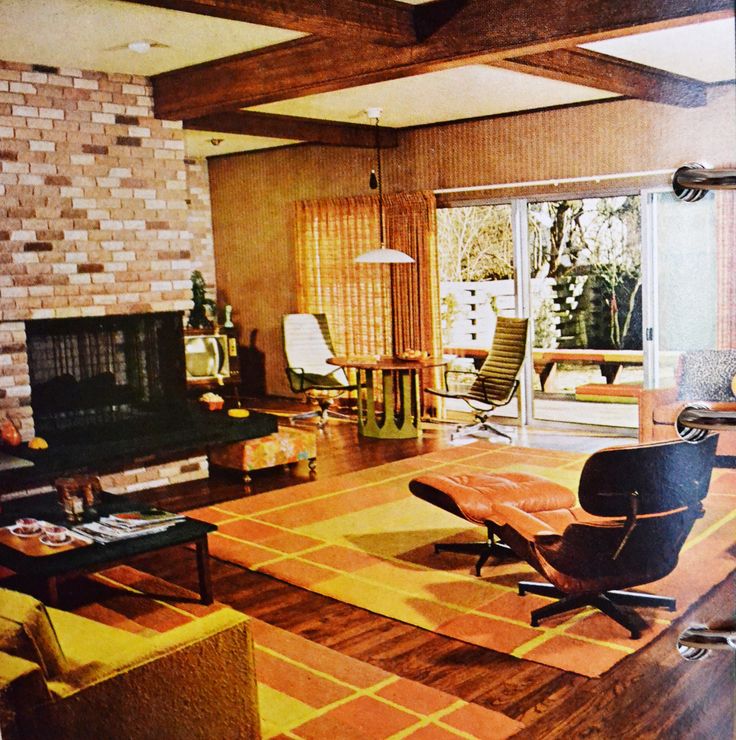 the living room is clean and ready to be used as a den or home office