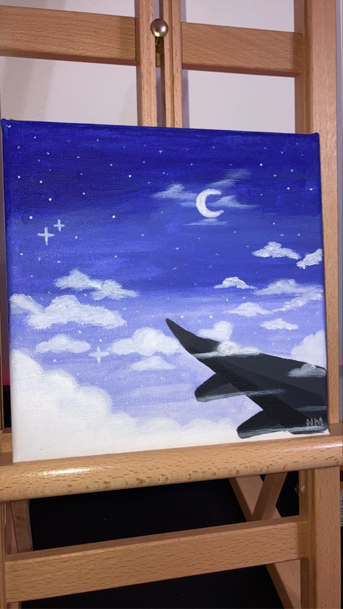 an airplane is flying in the night sky with clouds and stars painted on it's canvas