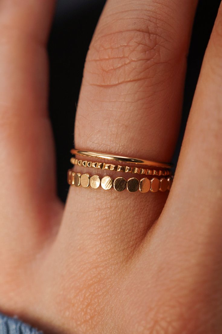 Our all-time-fav textured stacking rings! This combination of smooth, lined and bead is incredibly eye-catching. These stacking rings are perfect for mixing and matching! Either wear them all at once or mix them in with your favorite rings for extra sparkle! Each gold ring is individually cut, soldered and polished f Stackable Rings Gold, Stacking Rings Gold, Boo Basket, Gold Rings Stackable, Soft Autumn, Gold Ring Sets, Rings Gold, Gold Ring Stack, Favorite Rings