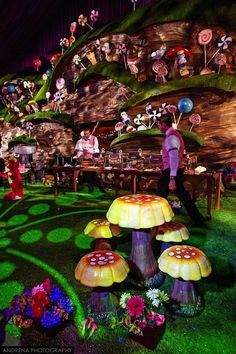 a group of mushrooms sitting on top of a lush green field