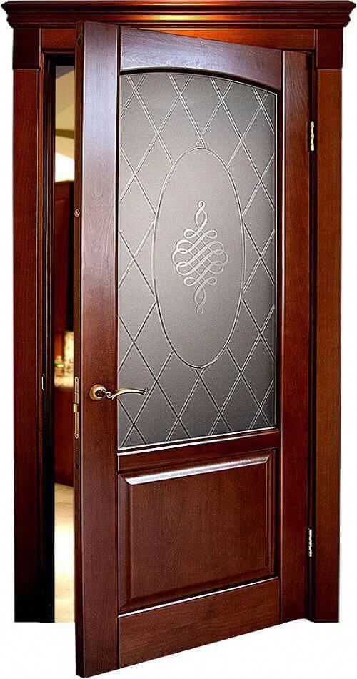 a wooden door with etched glass on the front and side panels inlayed to it