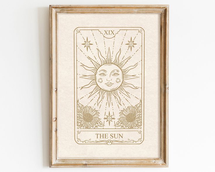 the sun tarot card mounted on a wall