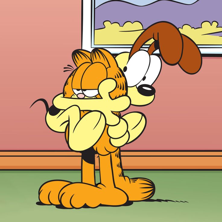 a cartoon dog with his paw on its face