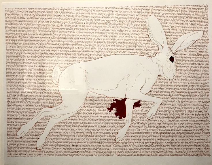 a drawing of a white rabbit laying on top of a piece of paper with words all over it