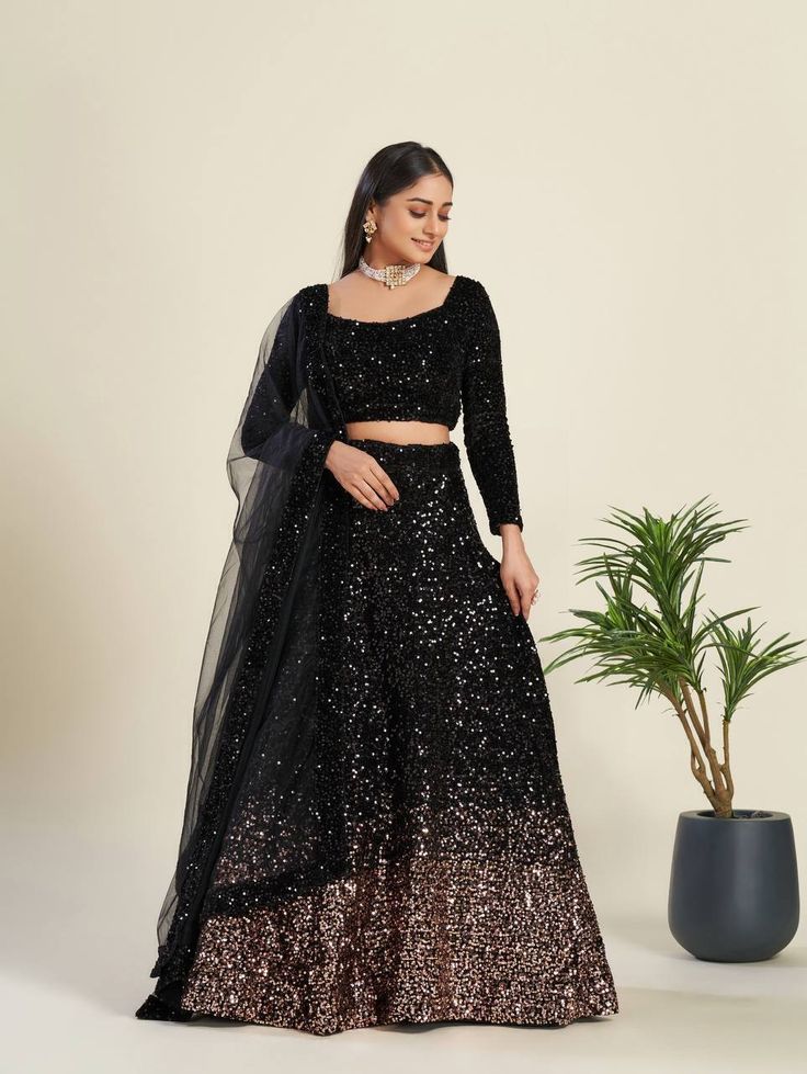 Fabric Details Lehenga Lehenga Fabric : Velvet lehenga Lehenga Work : heavy sequence work Lehenga Size : Max up to 42(XL)(Semi-Stitch) Lehenga Length : 40 to 42 Inch  Lehenga Flair : 3.25 Meter Can can attach Blouse  Blouse Fabric :  Velvet blouse Blouse Work : sequence work all over front & back Blouse Length : 0.80 Meter Blouse Size : Max Up to 42(XL) (UN-Stitch) Dupatta Dupatta Fabric :  Net Duppata Dupatta Work : sequence border work Dupatta Length : 2.10 Meter Weight : 1.600 KG Care Introdu Velvet Wedding Lehenga, Black Sequin Lehenga, Black Lehenga Choli, Sequin Lehenga, Velvet Lehenga, Velvet Wedding, Black Lehenga, Lengha Choli, Real Images