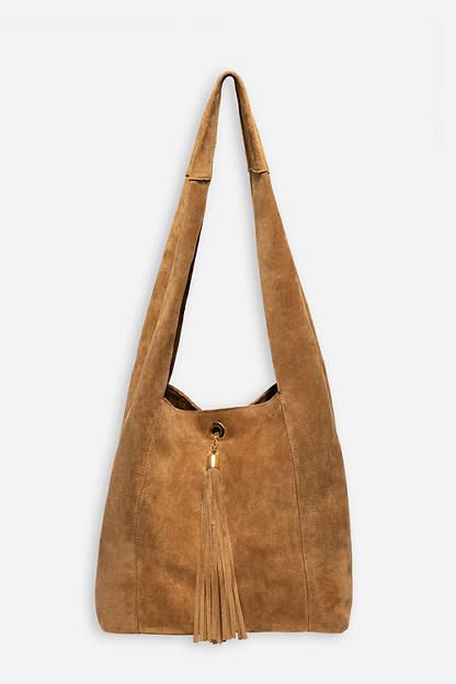 Crafted from 100% rich suede, the Tassel Chain Italian Suede Hobo Bag is perfect for daily use. Featuring a comfortable shoulder strap and wide top opening, this classic hobo style bag is finished with a decorative leather tassel at the front and a hook and eye closure. Pair with relaxed fit jeans and a casual blouse for a classic weekend look. Johnny Was Women's Tassel Chain Italian Suede Hobo Bag in Tan Brown, Leather/Suede Chic Suede Hobo Bag With Suede Lining, Elegant Suede Hobo Bag With Suede Lining, Chic Suede Hobo Bag With Adjustable Strap, Luxury Suede Hobo Bag With Soft Leather, Elegant Suede Hobo Bag, Elegant Everyday Suede Hobo Bag, Suede Tote Shoulder Bag With Gold-tone Hardware, Suede Shoulder Bag With Gold-tone Hardware For Travel, Rectangular Suede Hobo Bag With Suede Lining