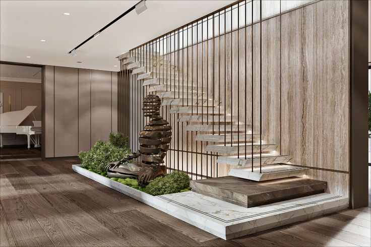 a spiral staircase in the middle of a room with wood flooring and white walls