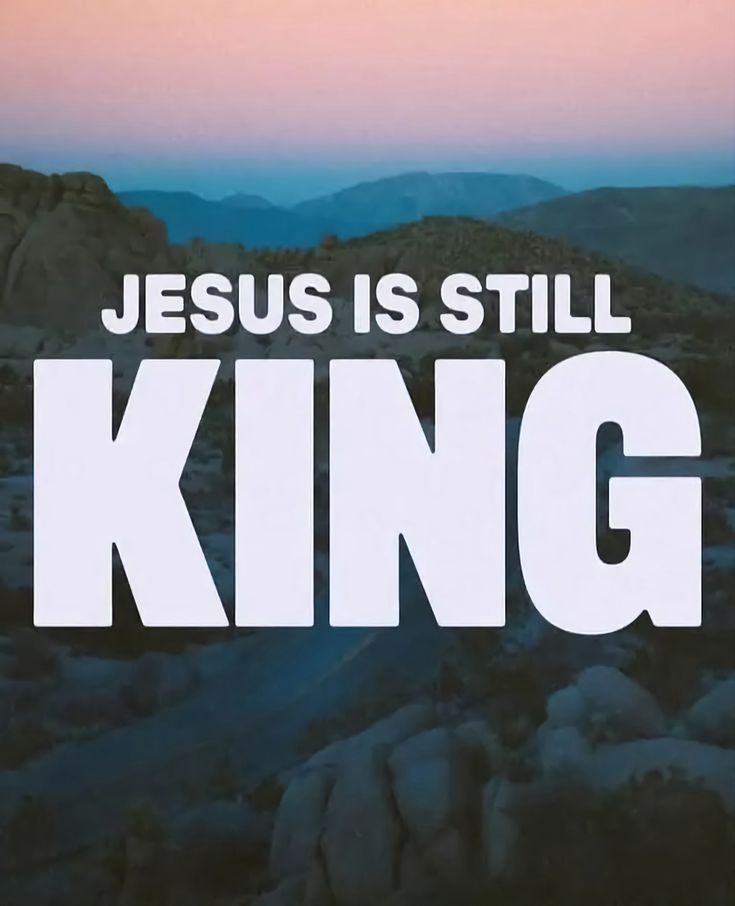 the words jesus is still king are displayed in front of a mountain range at sunset