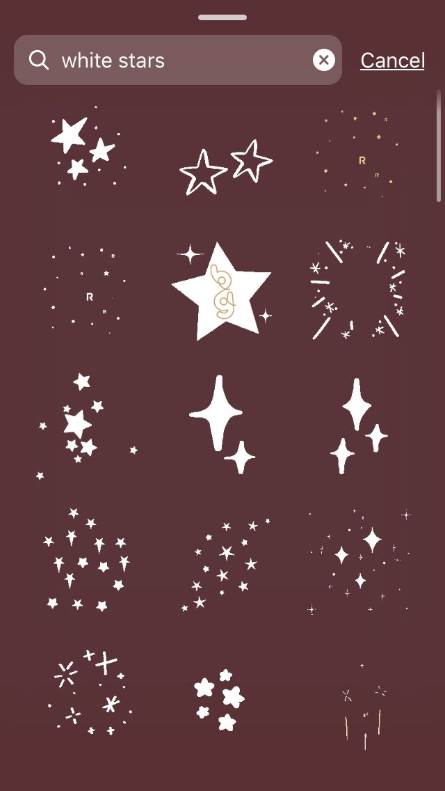 an iphone screen with stars and sparkles on the bottom right corner, which reads white stars